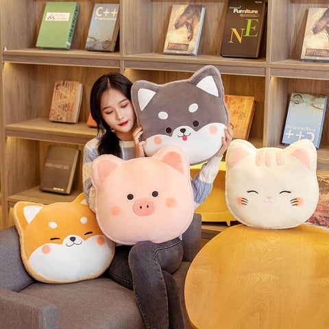 young woman sitting with cute kawaii chonky fluffy animal head pillows