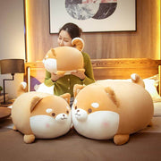 young woman cuddling orange brown cute kawaii fat chonky squishy soft shiba inu dog plushies