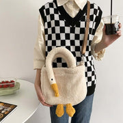 young woman wearing cute kawaii chonky soft fluffy goose neck tote bag handbag with shoulder strap