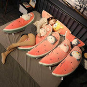 young woman hugging cute kawaii chonky fluffy squishy soft watermelon fruit animal plushie pillows in bed