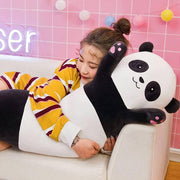 Young woman cuddling long cute kawaii chonky panda bear dakimakura plushie body pillow