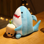 cute chonky squishy blue shark plushie holding boba bubble milk tea