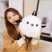 young woman playing with white fluffy cute kawaii chonky sparrow bird plushie backpack bag with wings