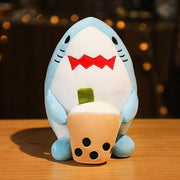 cute chonky squishy blue shark plushie holding boba bubble milk tea in front view