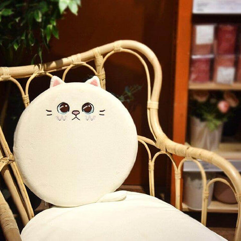 cute kawaii chonky round cat plush pillow cushion with tail and white fur sitting on chair