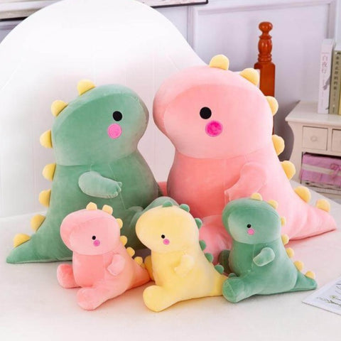 cute kawaii chonky squishy pink, yellow, and green dinosaur plushies