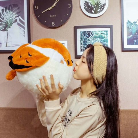 young woman kissing cute kawaii chonky round borb birb bird plushie with brown, white, and black wings