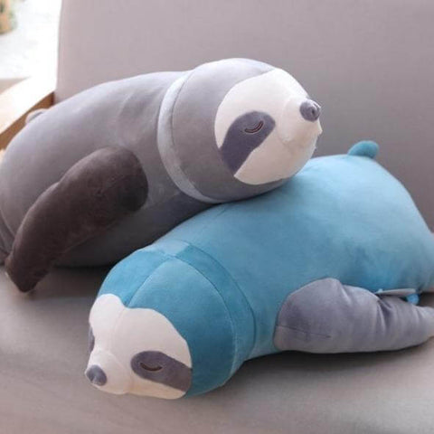 gray and blue sleepy cute kawaii chonky sloth plushies lying down
