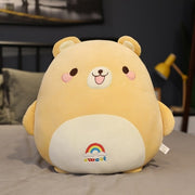 cute chonky squishy green bear plushie with a rainbow on its belly