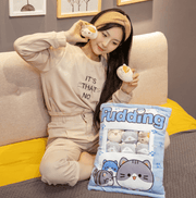 young woman playing with cute kawaii chonky bag of mini squishy pudding brown and gray cat plushie balls